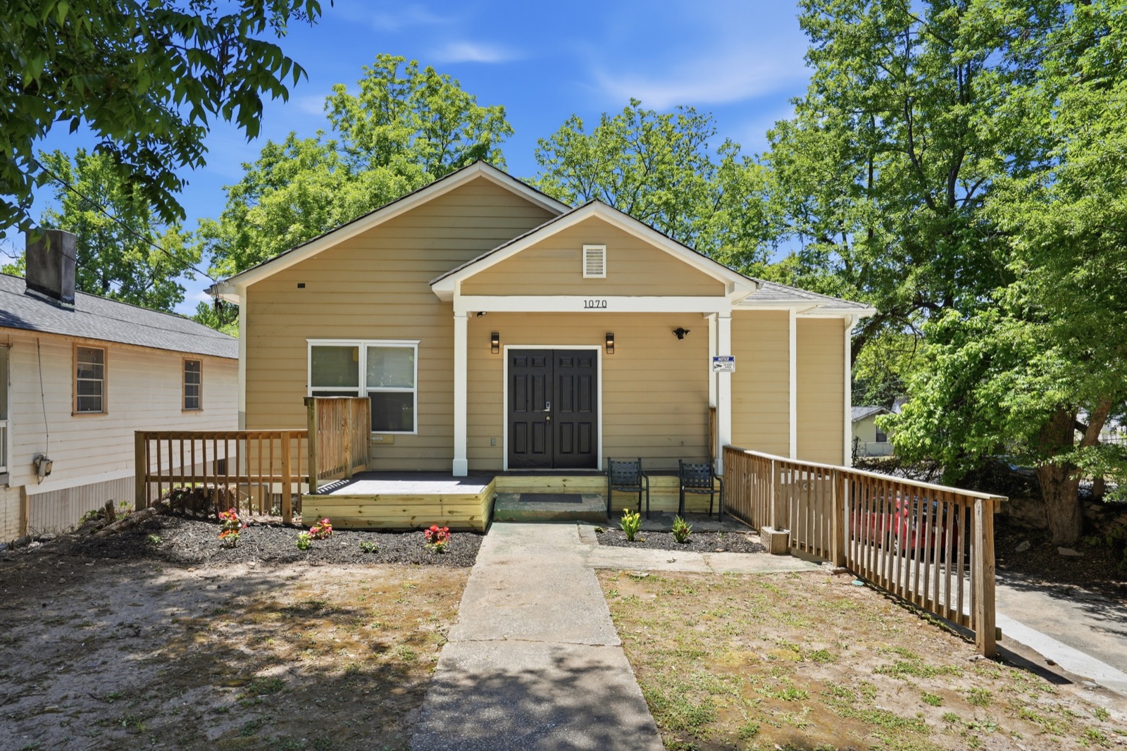Front exterior with fresh landscaping