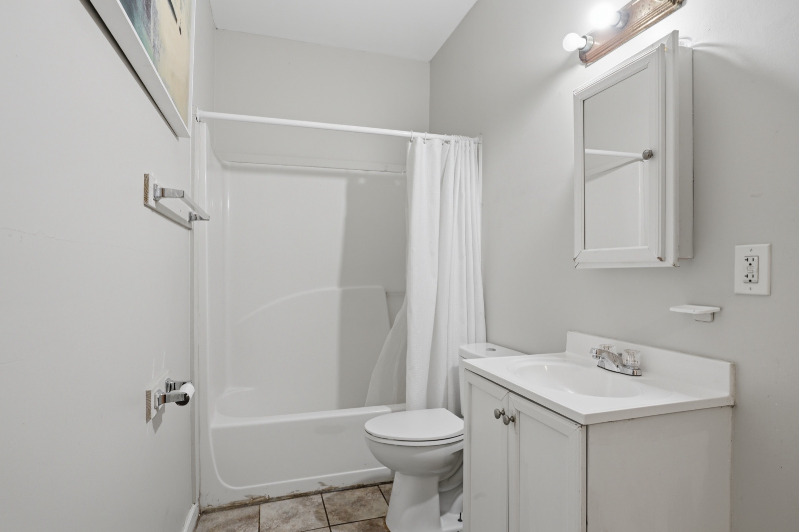 Bathroom with tub and shower