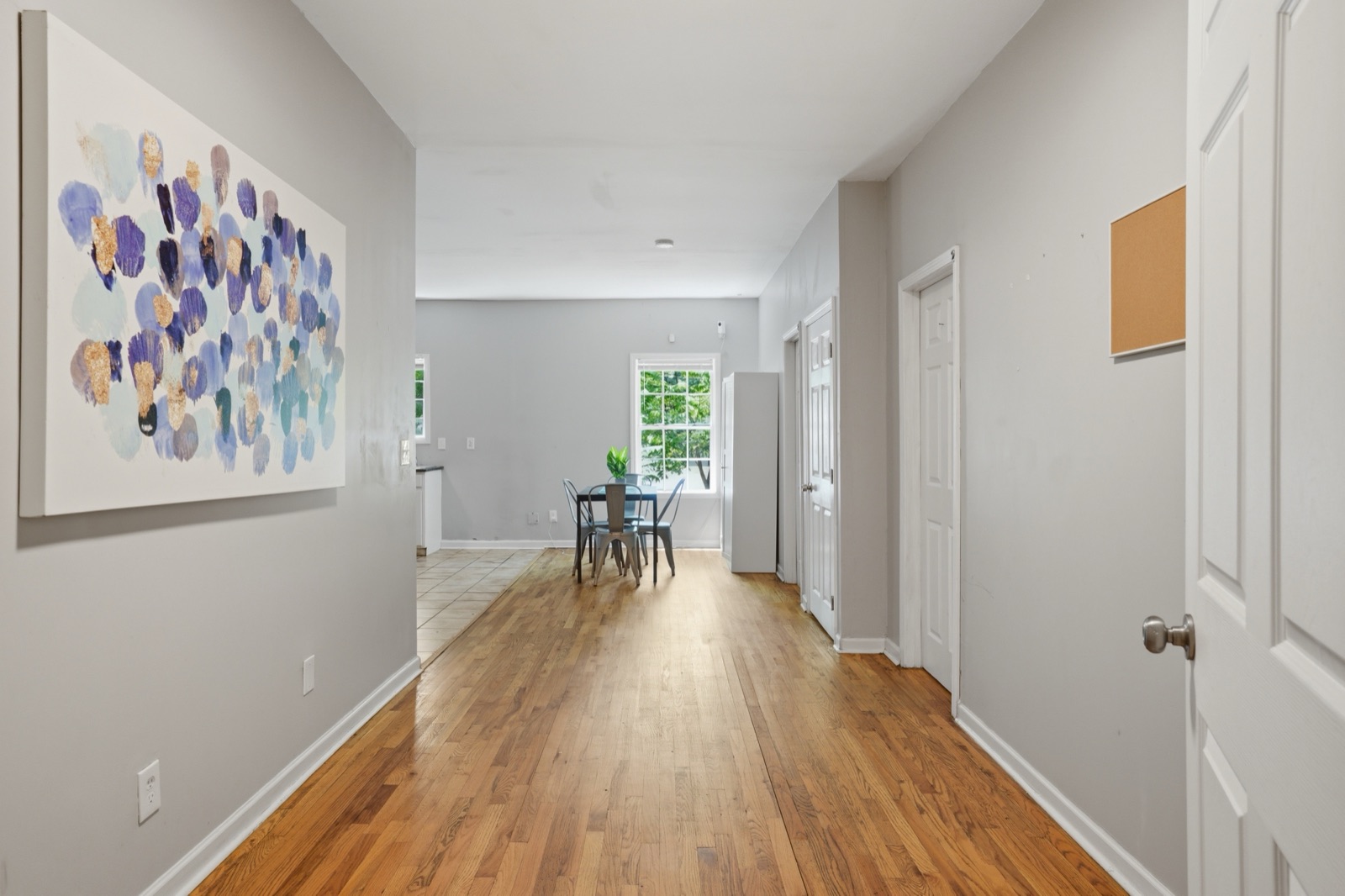 Hallway opening to dining area